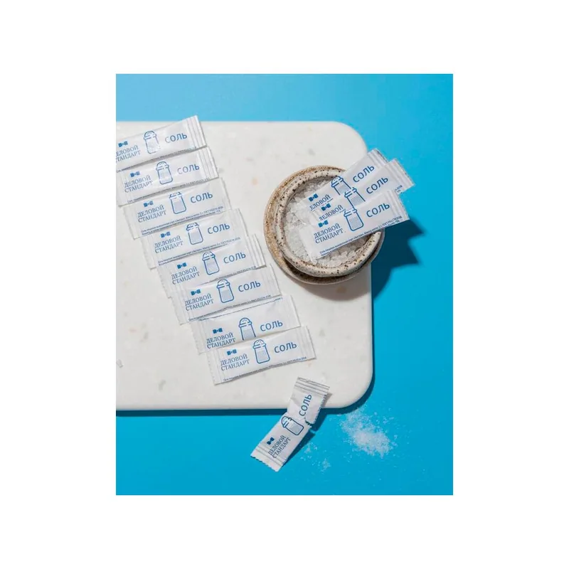 Single-serve salt sticks and salt crystals on a serving tray